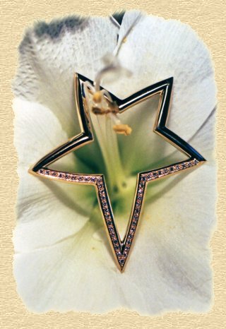Brosche "Der Stern" aus 750/ooo Gelbgold mit Diamanten