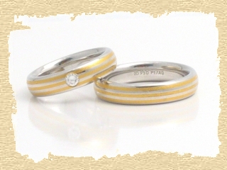 Partnerringe aus 750/Weiß- und Gelbgold mit Diamant